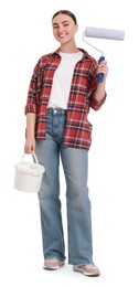 Young decorator with paint roller and bucket on white background