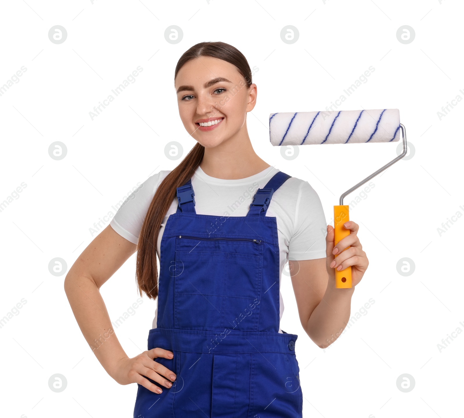 Photo of Portrait of young decorator with paint roller on white background