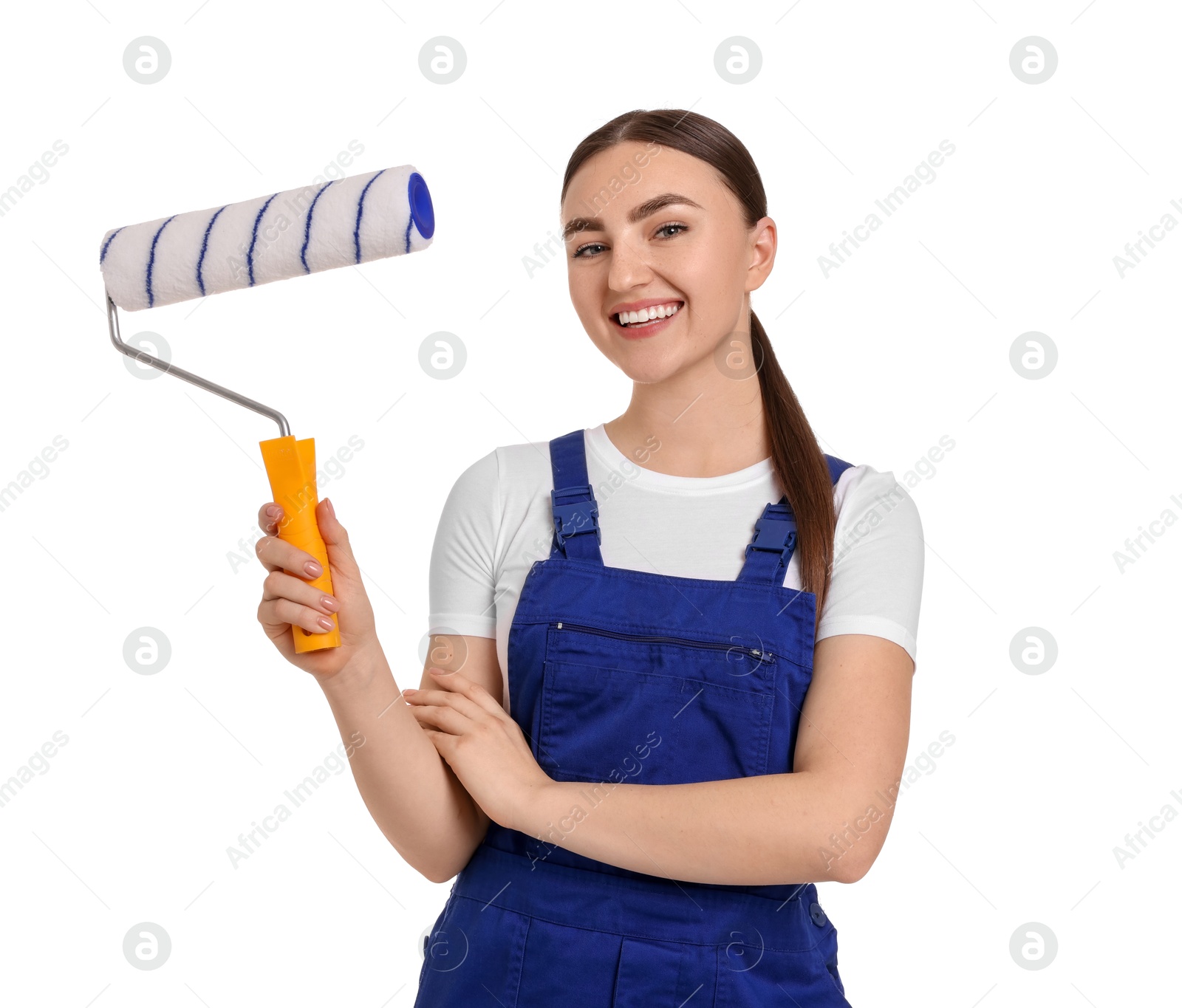 Photo of Portrait of young decorator with paint roller on white background