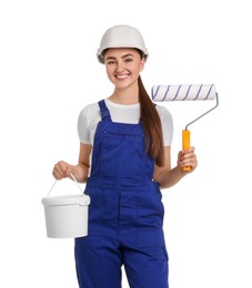 Portrait of young decorator with paint roller and bucket on white background