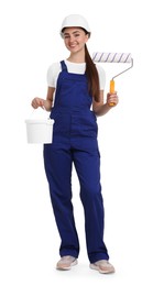 Young decorator with paint roller and bucket on white background