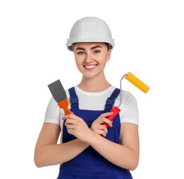 Portrait of young decorator with paint roller and putty knife on white background