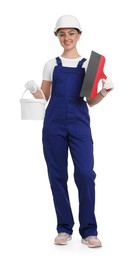 Young decorator with putty knife and paint bucket on white background