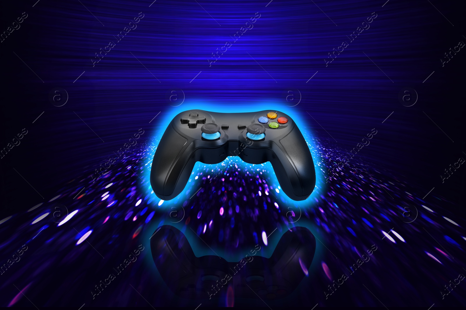 Image of Glowing video game controller on dark blue gradient background with speed light trails, motion blur effect. Creative poster