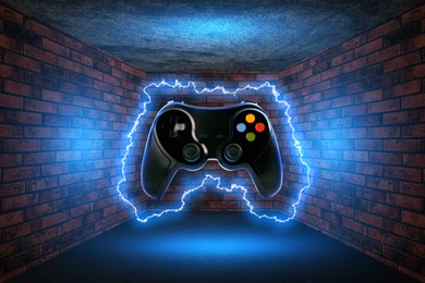 Image of Video game controller in room with brick walls. Lightning around device. Creative poster