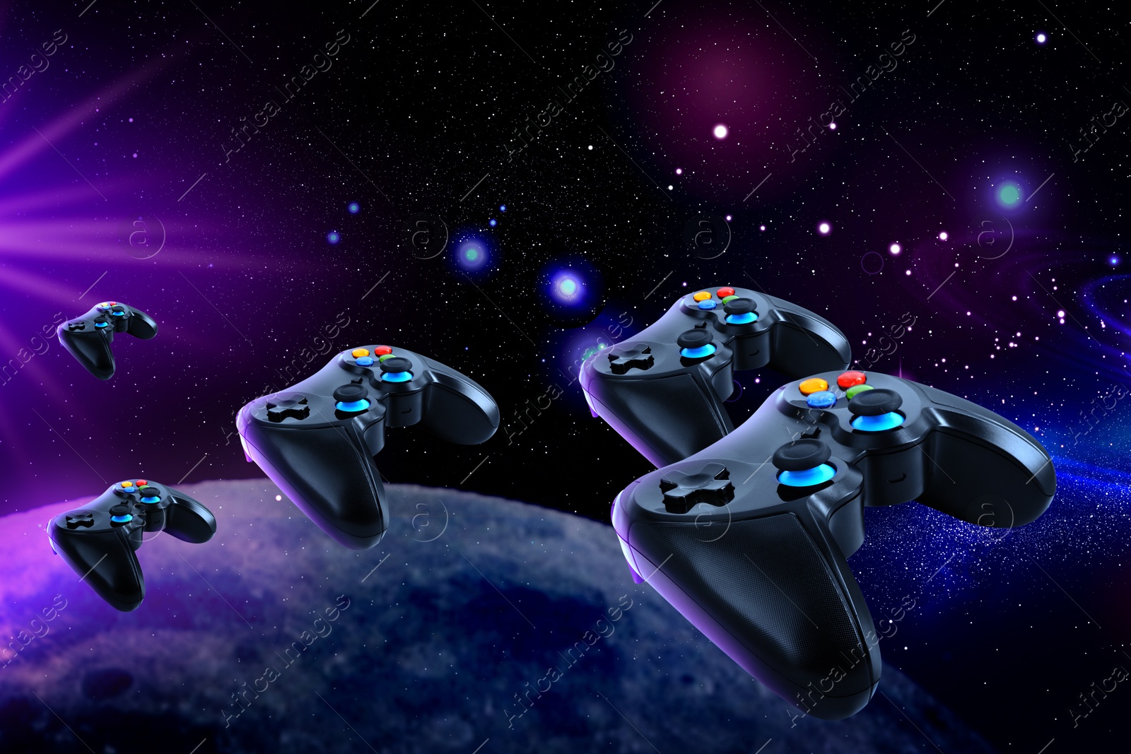 Image of Video game controllers flying in cosmos. Playing space flight simulation