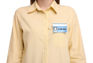 Image of Woman with doctor's badge on white background, closeup