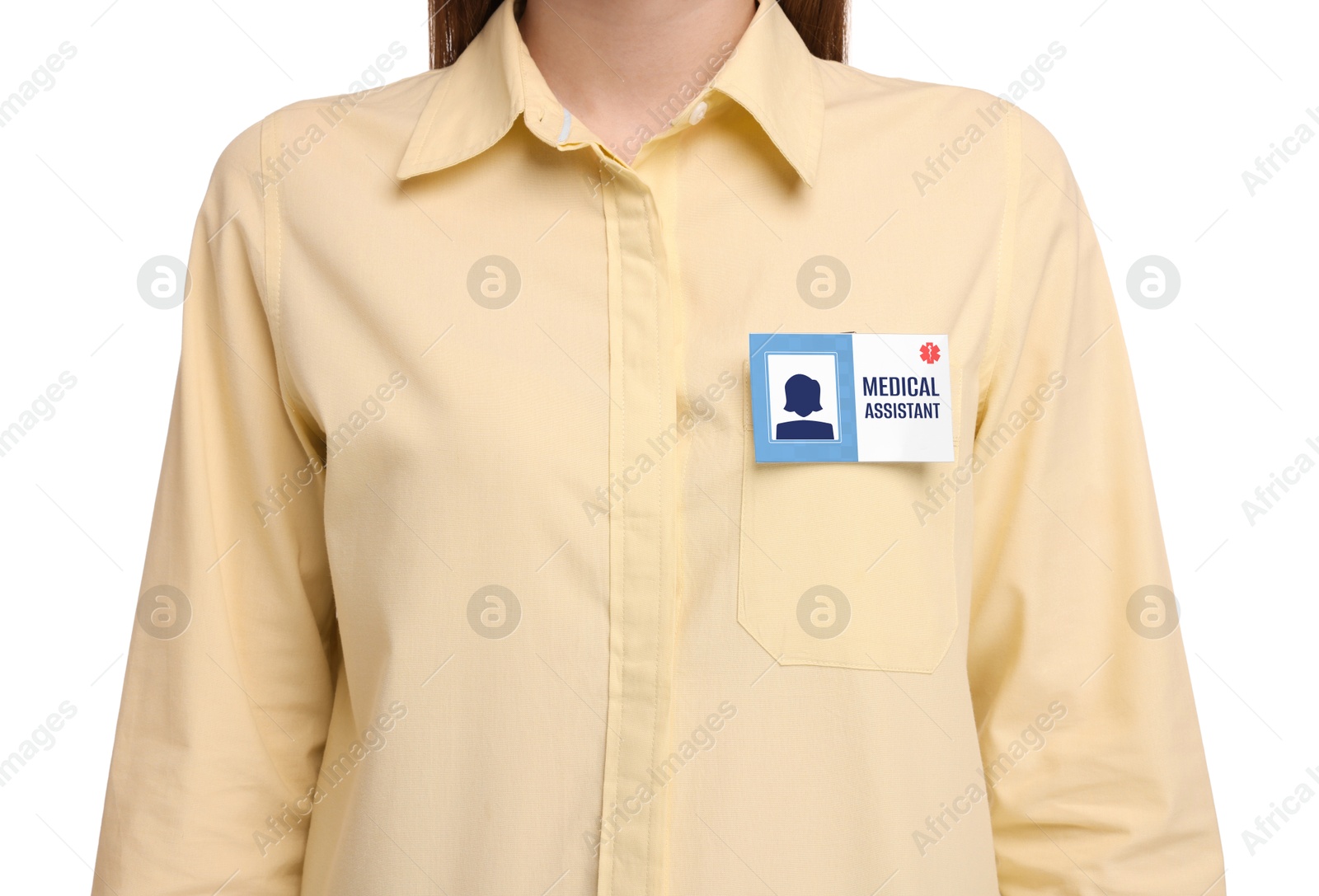 Image of Woman with medical assistant badge on white background, closeup