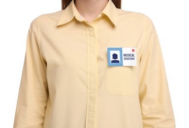 Image of Woman with medical assistant badge on white background, closeup