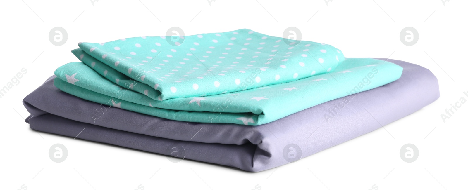 Photo of Stack of clean bed linen isolated on white