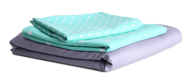 Photo of Stack of clean bed linen isolated on white