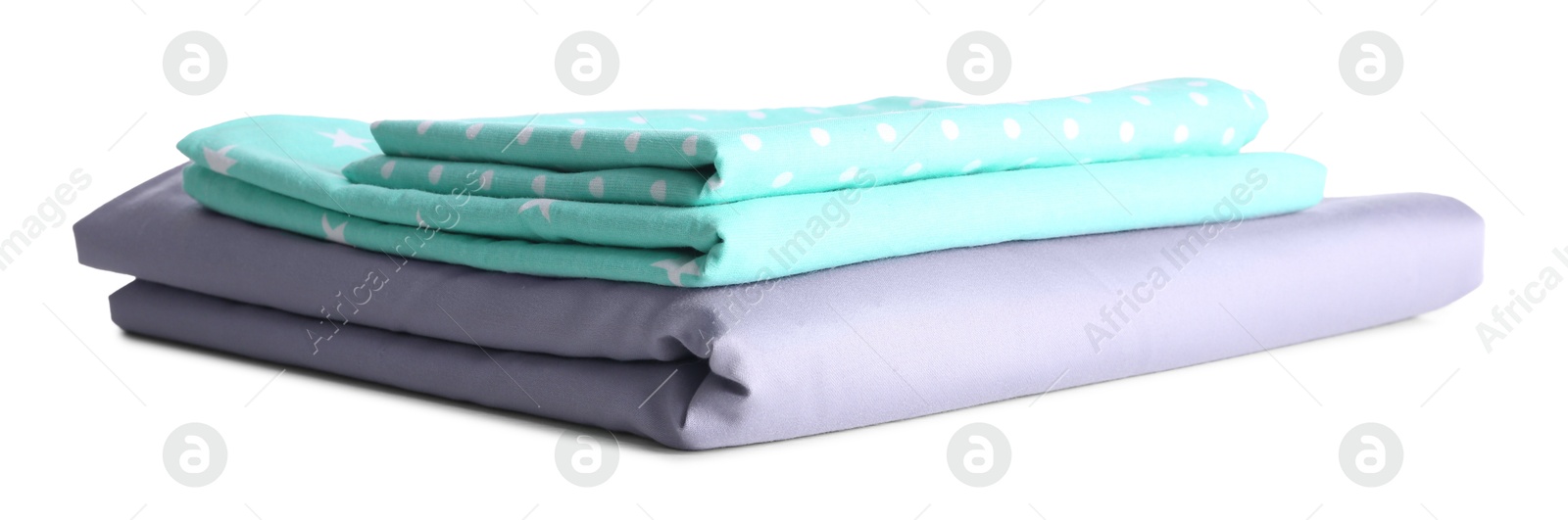 Photo of Stack of clean bed linen isolated on white