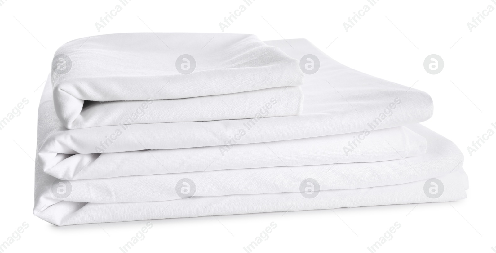 Photo of Stack of clean bed linen isolated on white