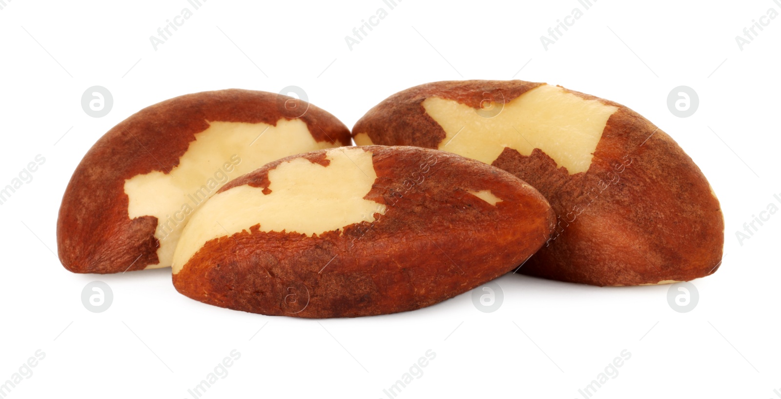 Photo of Tasty Brazil nuts isolated on white. Healthy snack