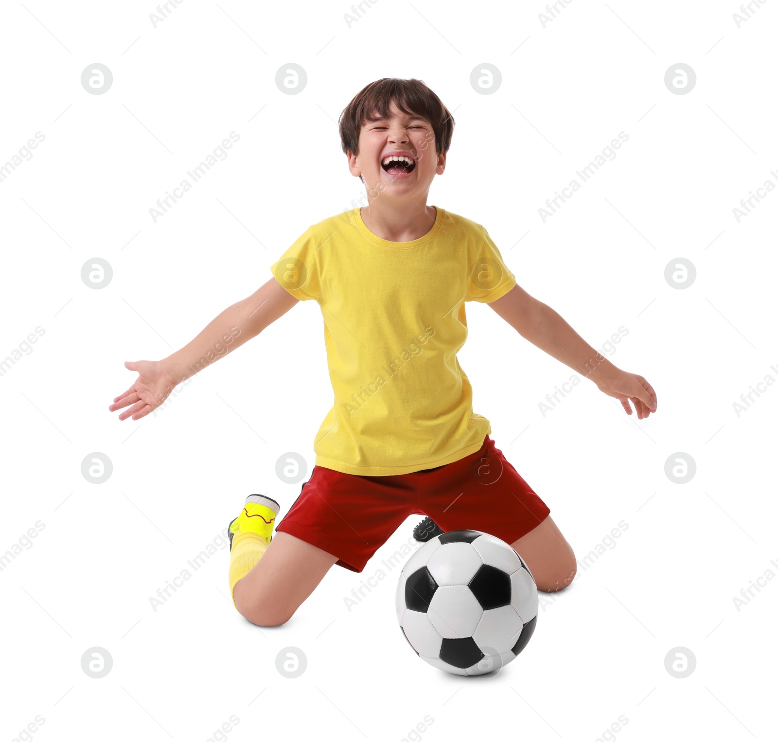 Photo of Emotional football player with soccer ball on white background