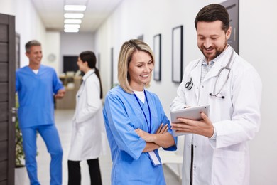 Photo of Healthcare workers in hospital, selective focus. Medical service