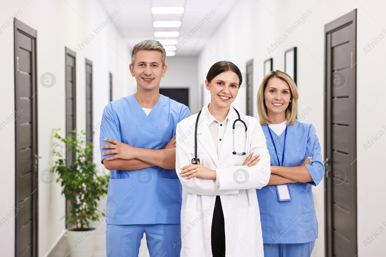 Photo of Portrait of smiling healthcare workers in hospital