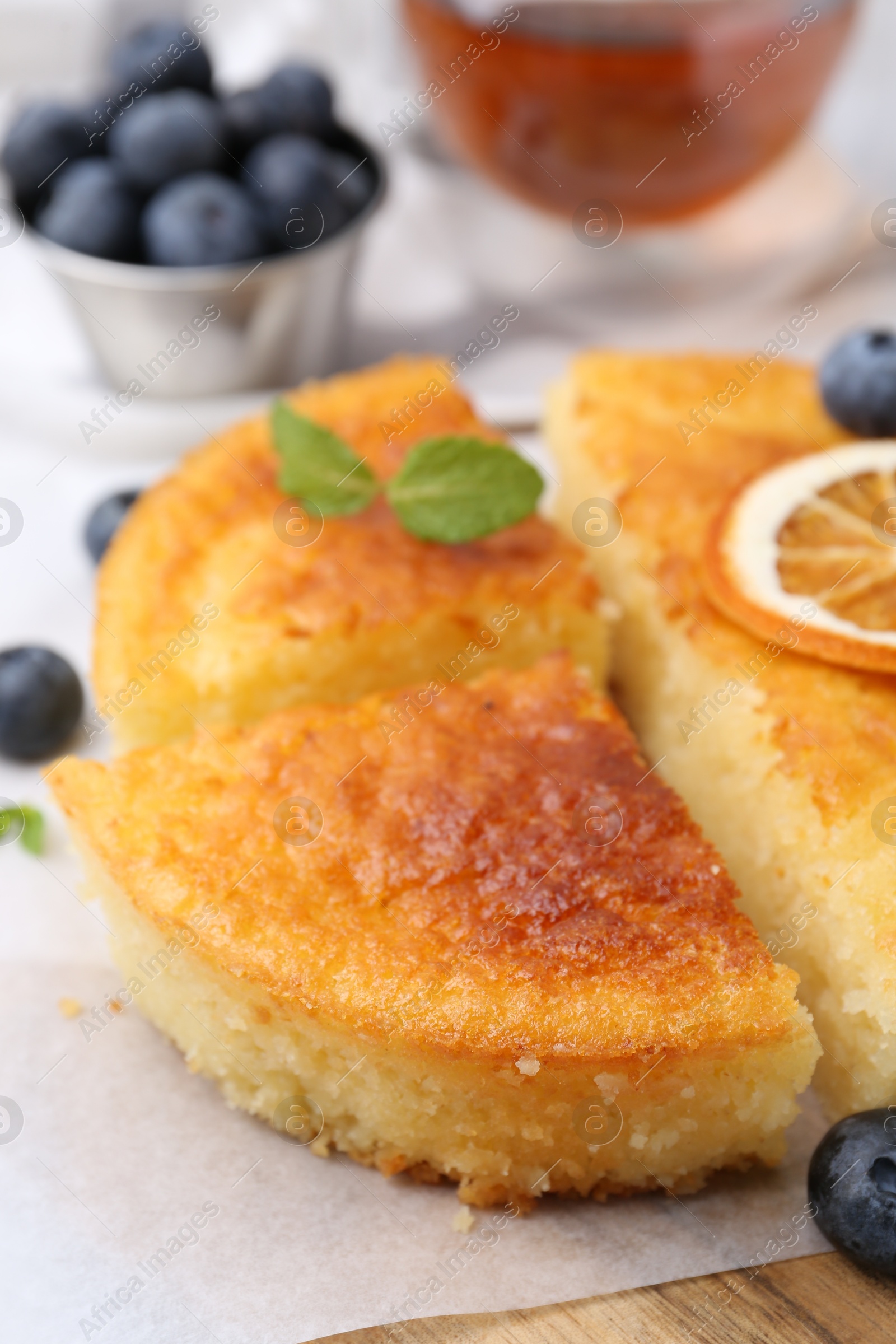 Photo of Tasty semolina cake served on table, closeup