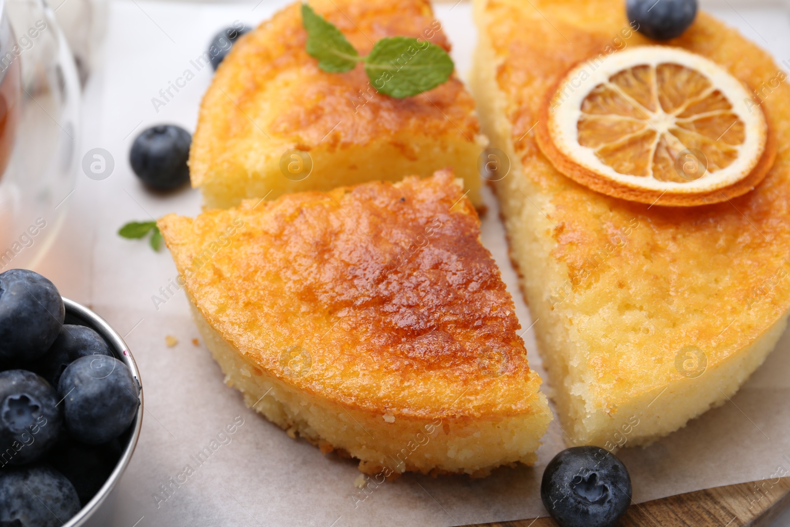 Photo of Tasty semolina cake served on table, closeup