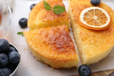 Tasty semolina cake served on table, closeup