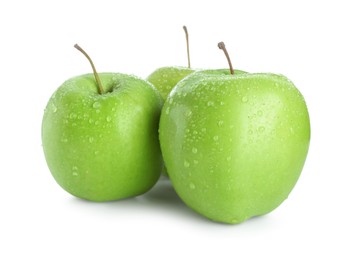 Photo of Three fresh green apples isolated on white