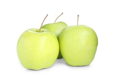 Photo of Three fresh green apples isolated on white