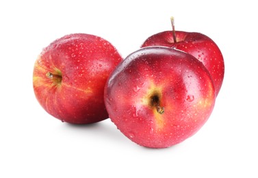 Photo of Three fresh red apples isolated on white