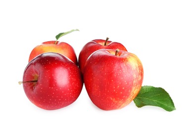 Photo of Many fresh red apples and green leaves isolated on white