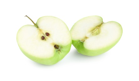 Photo of Halves of fresh green apple isolated on white