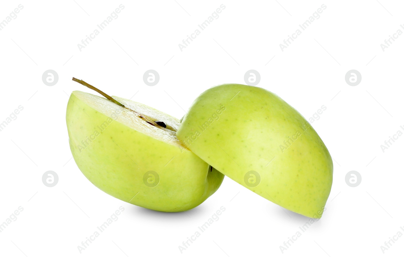 Photo of Halves of fresh green apple isolated on white