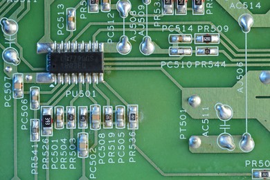 Photo of Electronic circuit board as background, top view