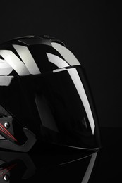 Photo of Motorcycle helmet with visor on black background