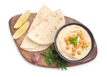 Photo of Delicious hummus with chickpeas and pita isolated on white, top view