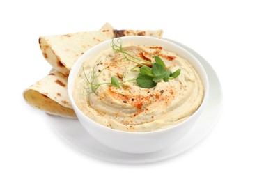 Photo of Delicious hummus with paprika and pita isolated on white