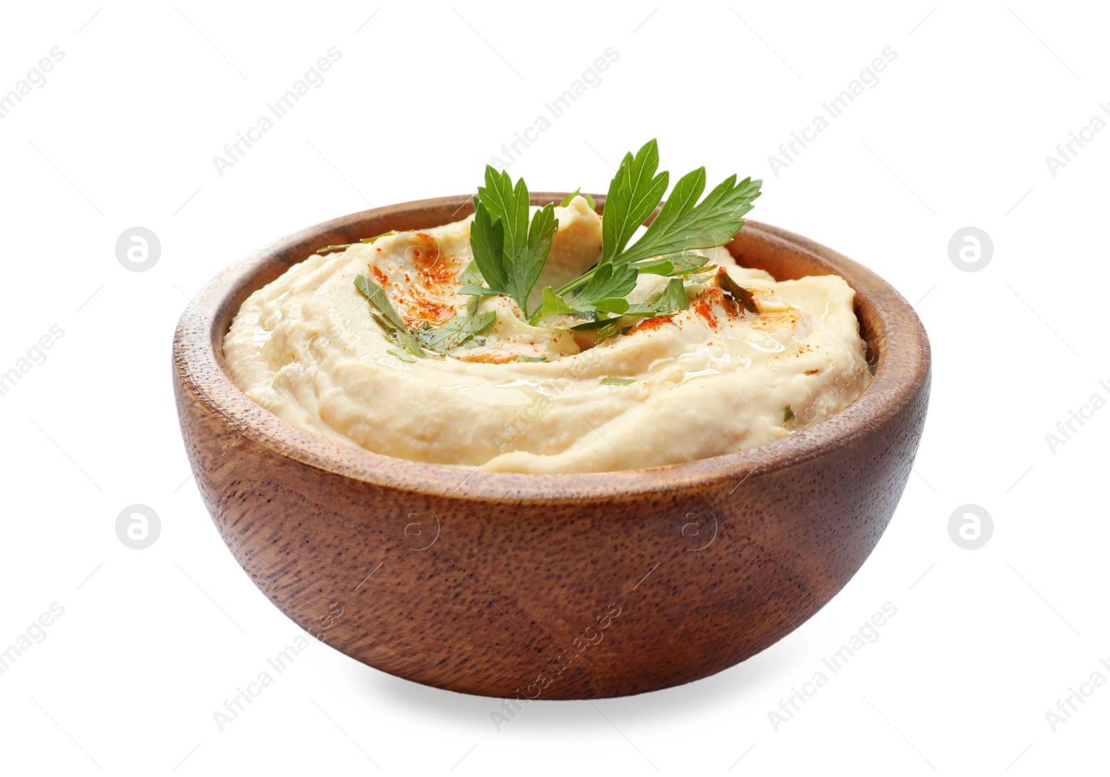 Photo of Delicious hummus with paprika and parsley in bowl isolated on white