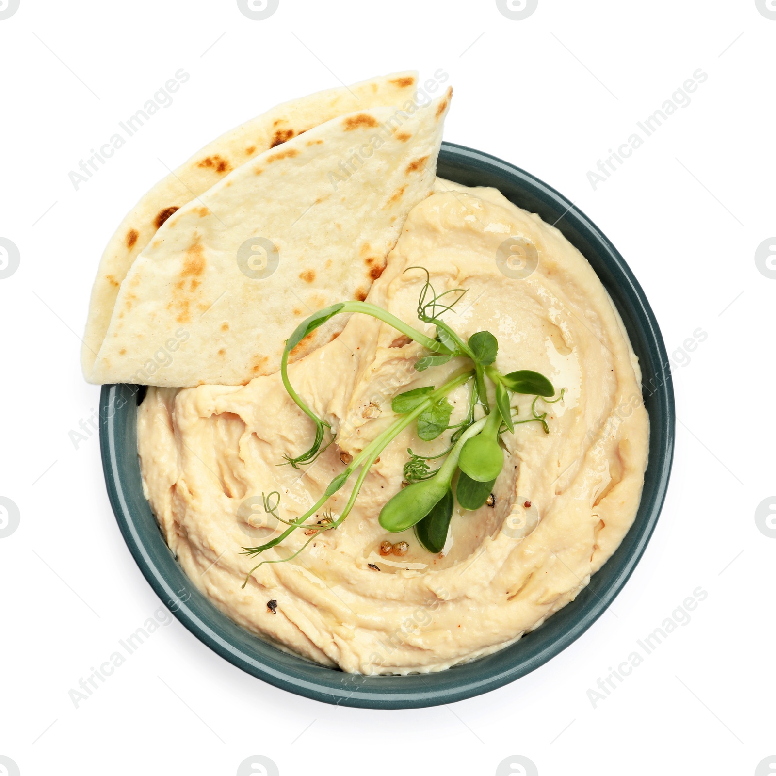 Photo of Delicious hummus in bowl and pita isolated on white, top view