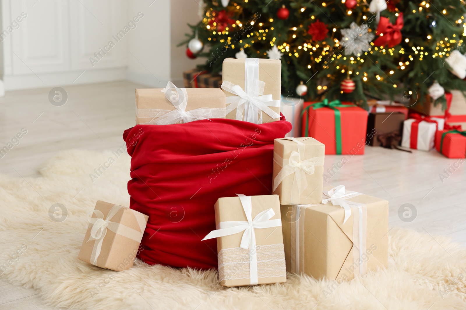 Photo of Santa bag full of Christmas presents at home