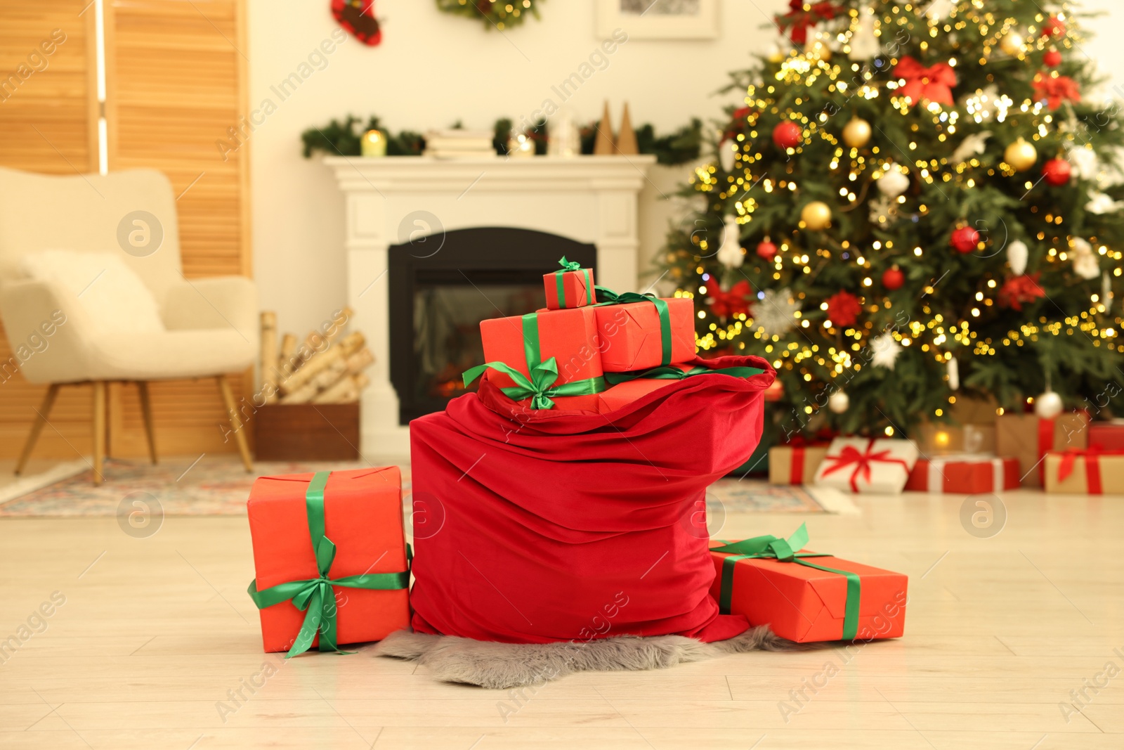 Photo of Santa bag full of Christmas presents at home