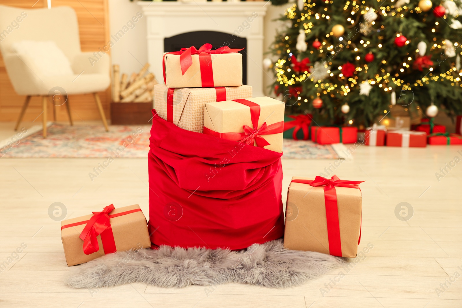 Photo of Santa bag full of Christmas presents at home