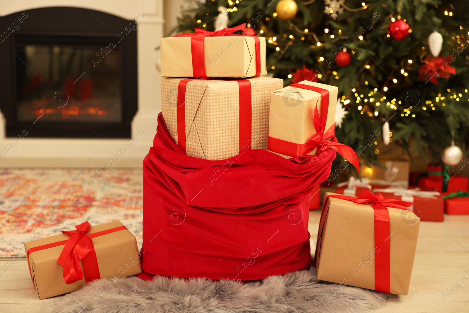 Photo of Santa bag full of Christmas presents at home