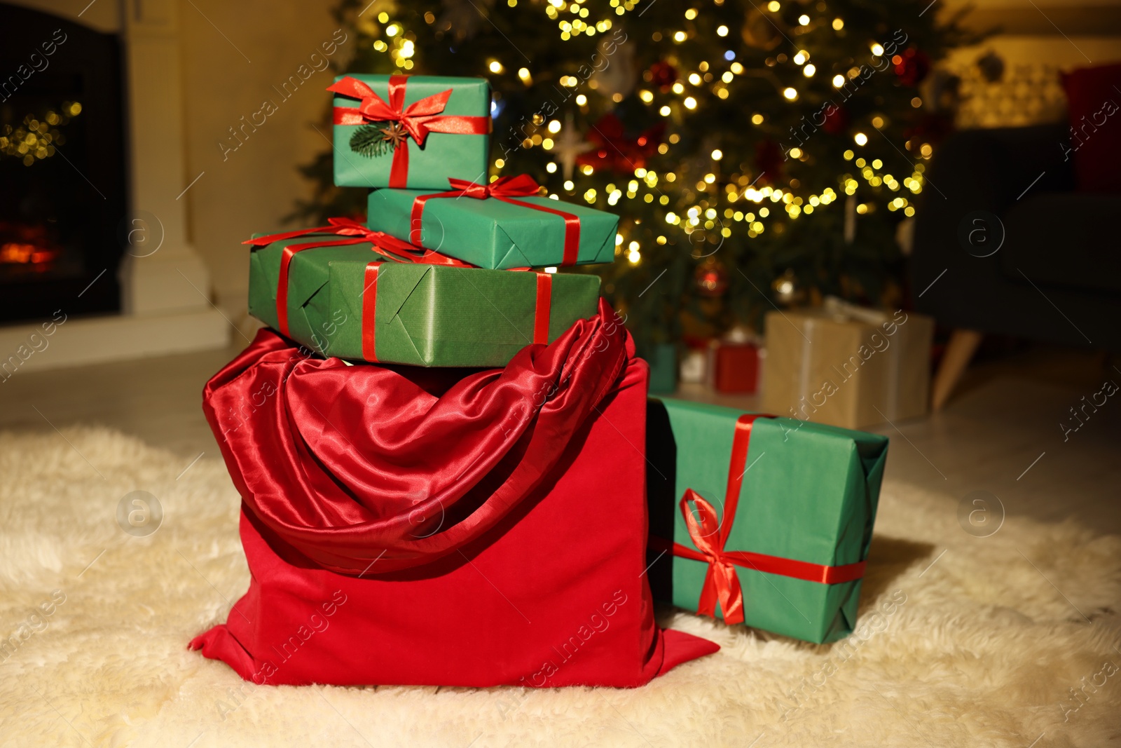 Photo of Santa bag full of Christmas presents at home