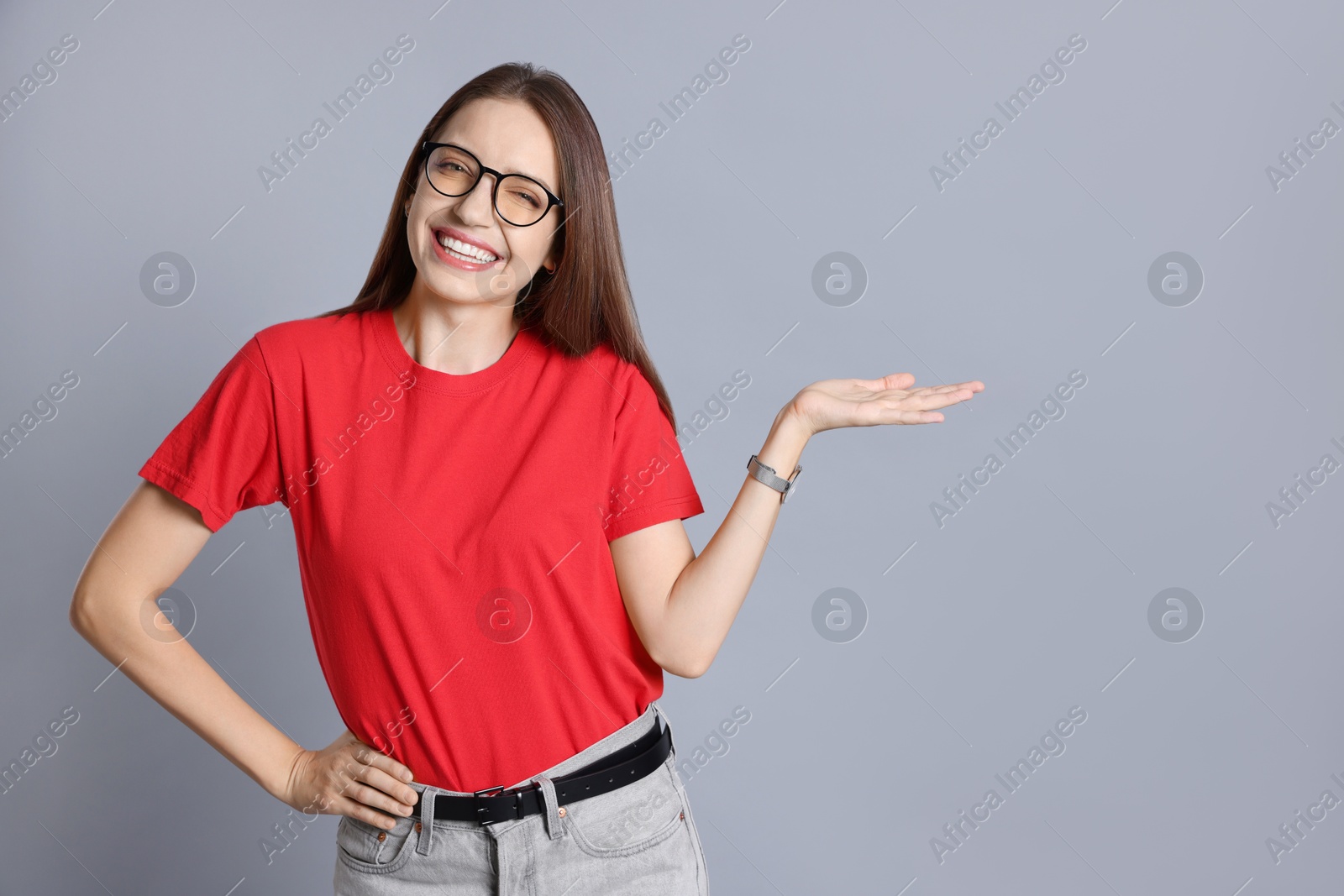 Photo of Portrait of happy winner on gray background