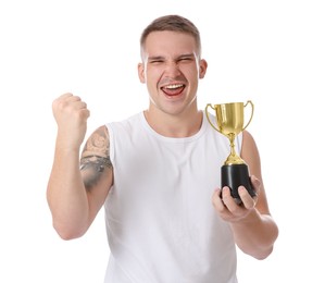 Happy winner with golden trophy cup on white background