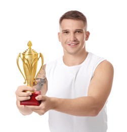 Happy winner with golden trophy cup on white background