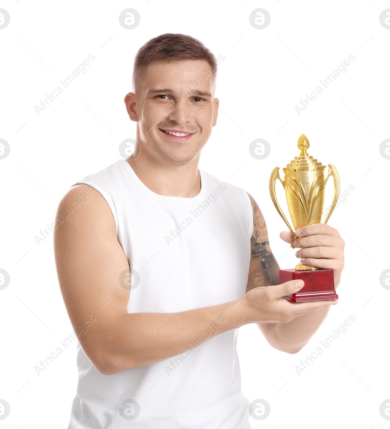 Photo of Happy winner with golden trophy cup on white background