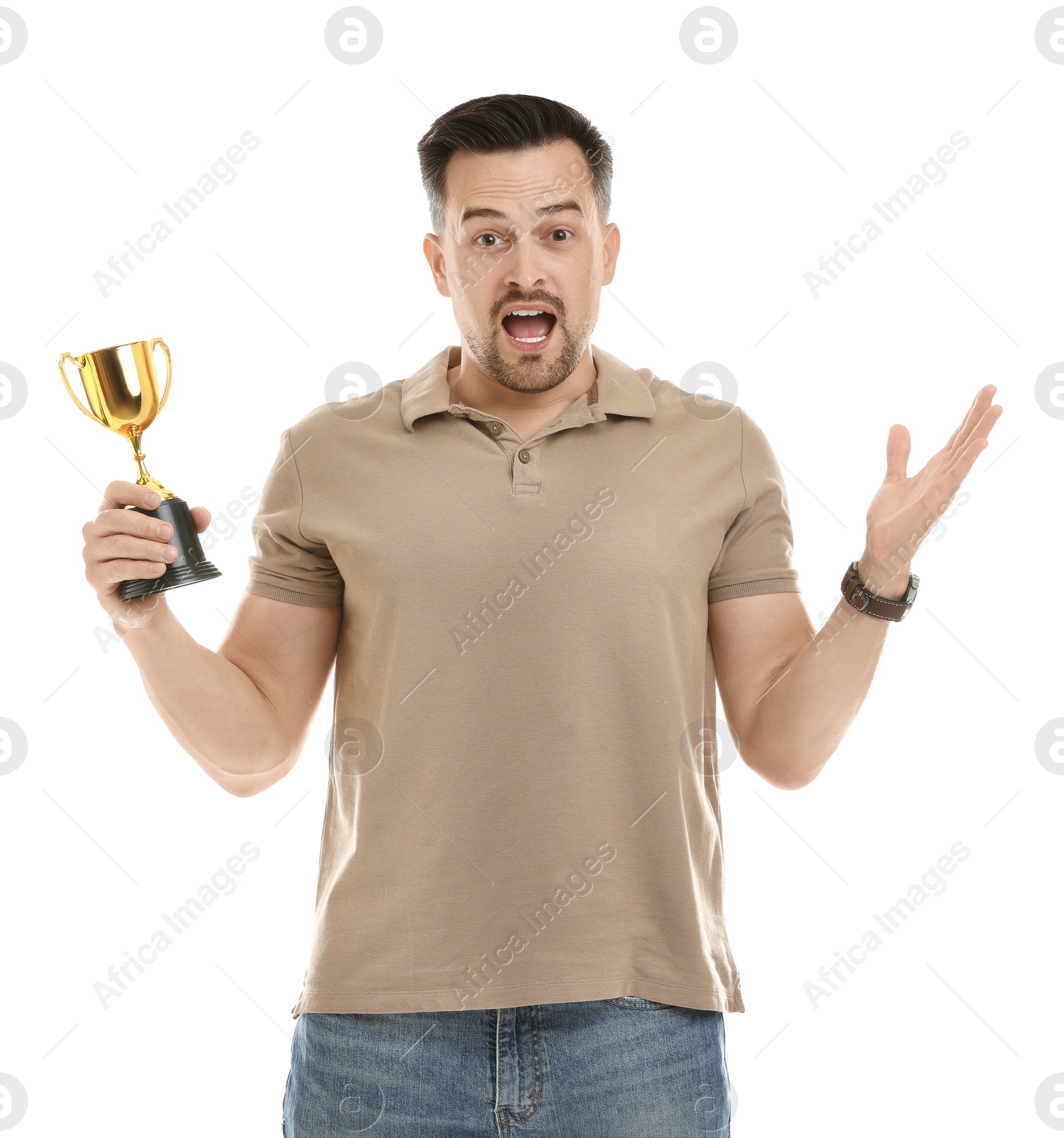 Photo of Emotional winner with golden trophy cup on white background