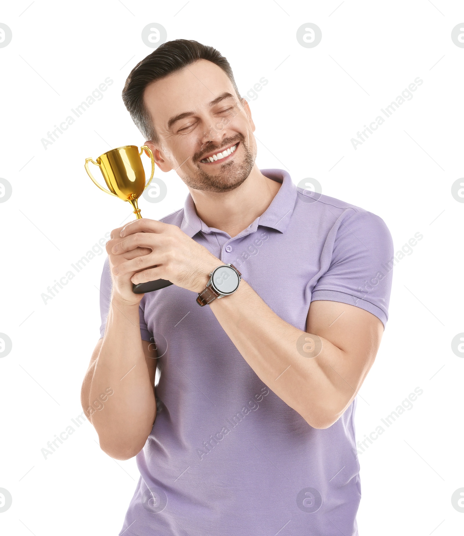 Photo of Happy winner with golden trophy cup on white background