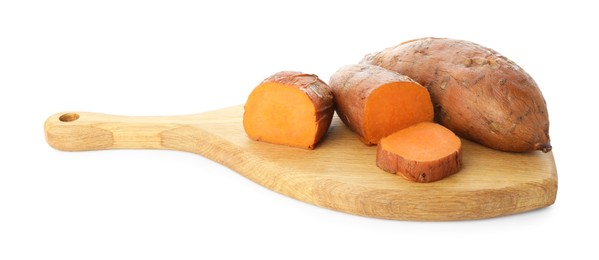 Photo of Tasty cooked sweet potatoes and wooden board isolated on white