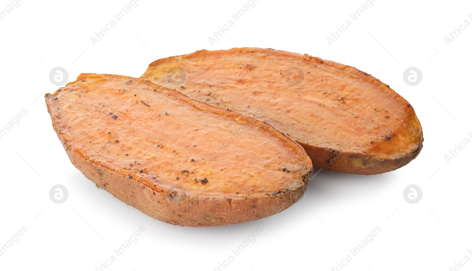 Photo of Halves of tasty cooked sweet potato isolated on white