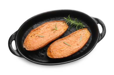 Photo of Halves of tasty cooked sweet potato with rosemary in baking dish isolated on white, top view